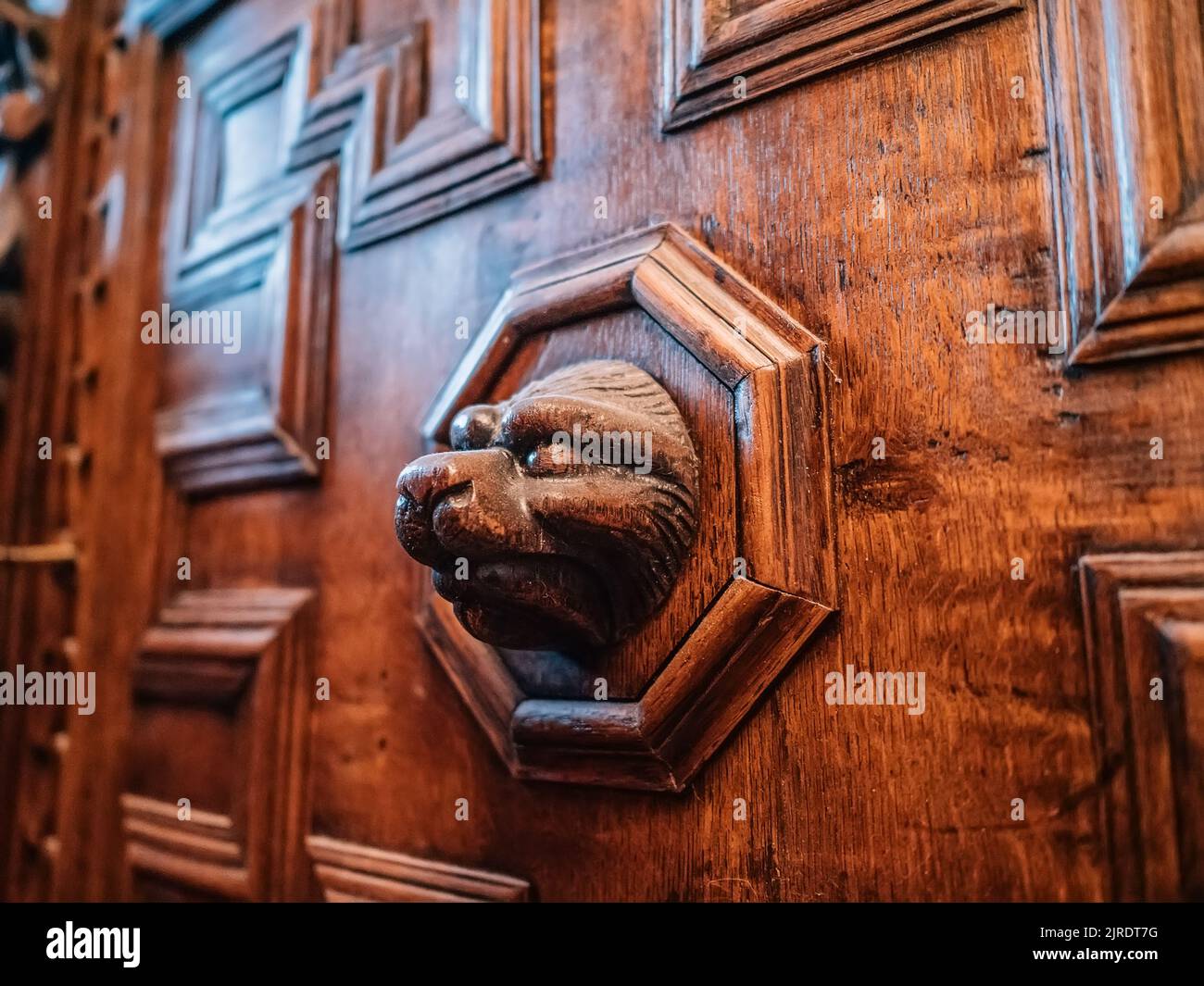 Close-up of a fragment of old antique wood furniture. Antique furniture from the 19th century. Stock Photo