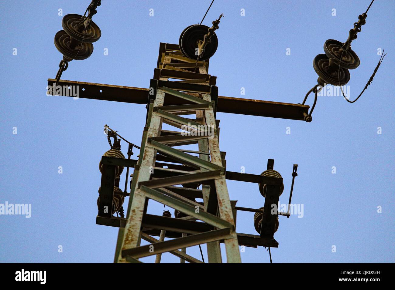 Electricity transmission tower at a small village in Luxor, Egypt Stock Photo