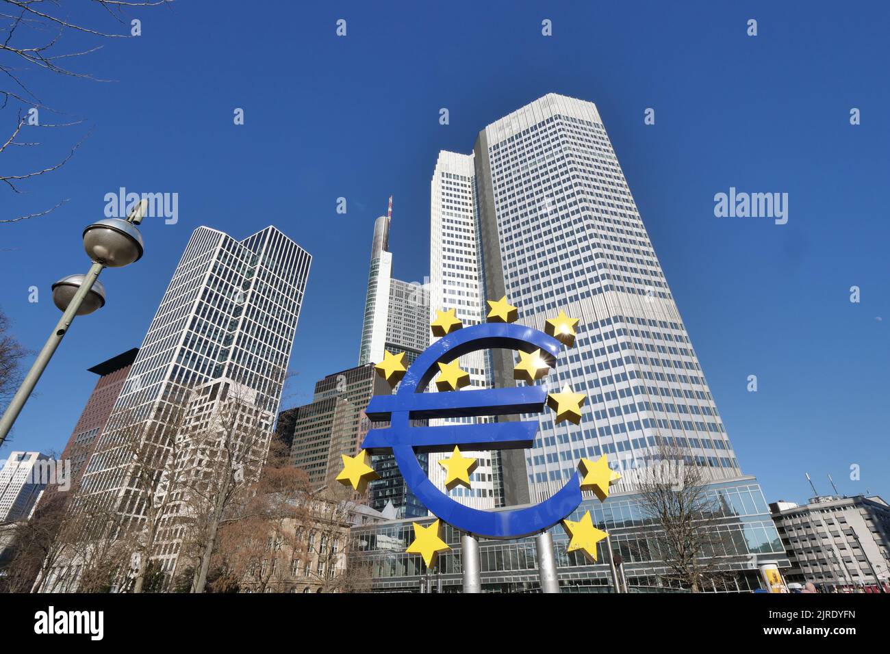 A low angle of the Euro sign in front of the central bank building in Frankfurt am Main, Germany Stock Photo