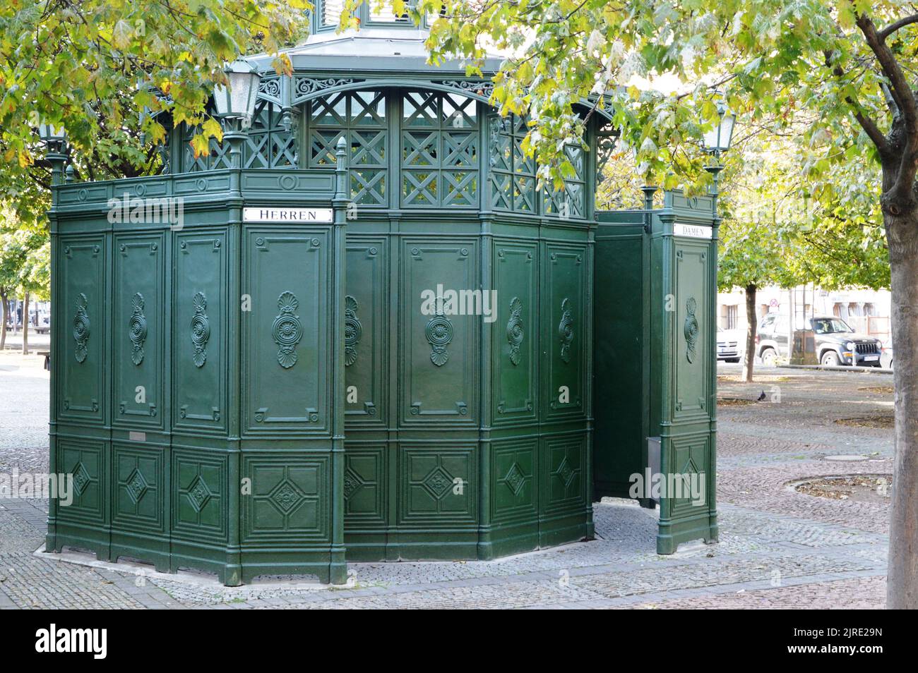 A old style octagonal public toilet still in operation in the middle of ...