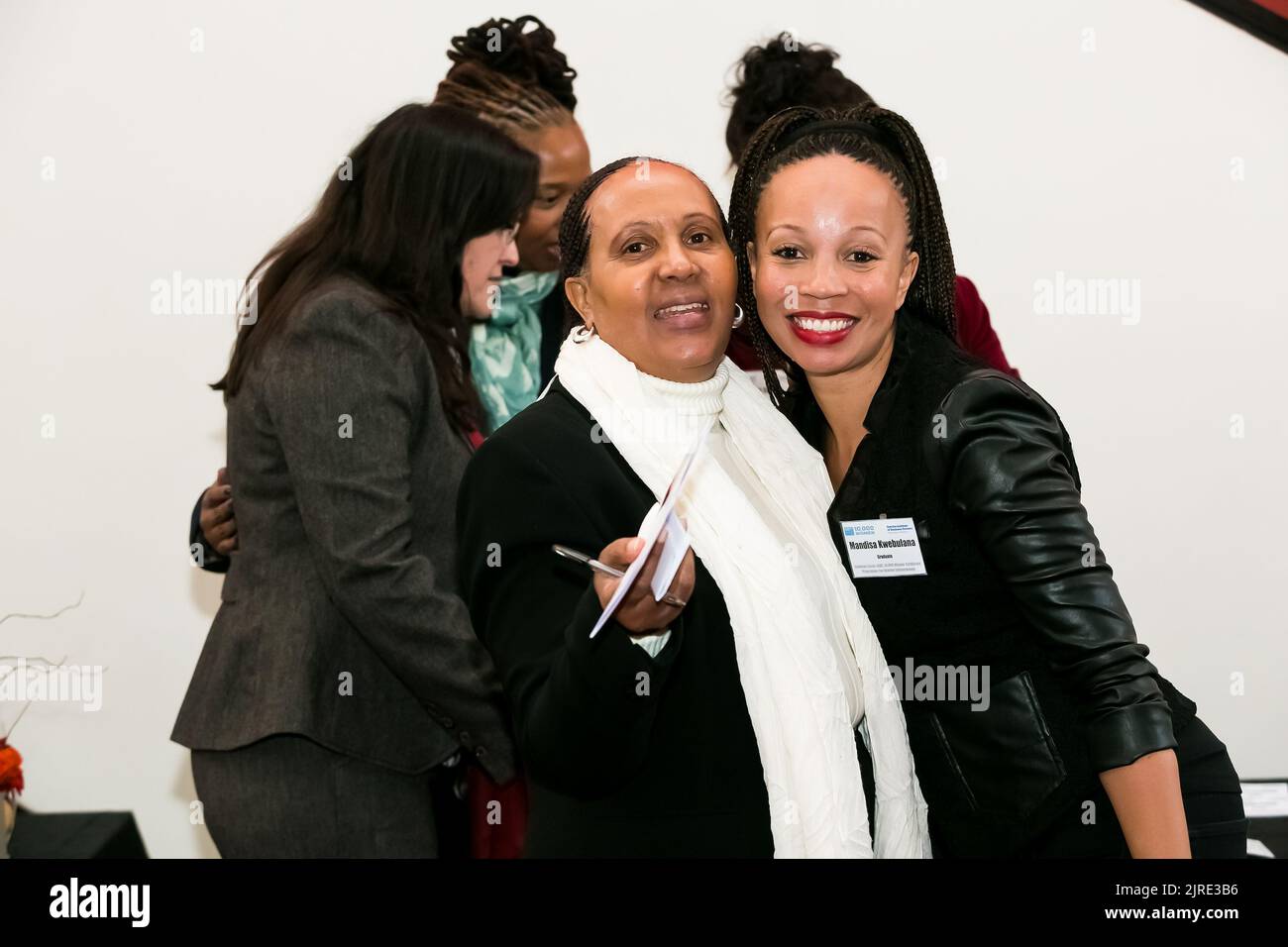 Johannesburg, South Africa July 14, 2014 Diverse woman networking at corporate convention