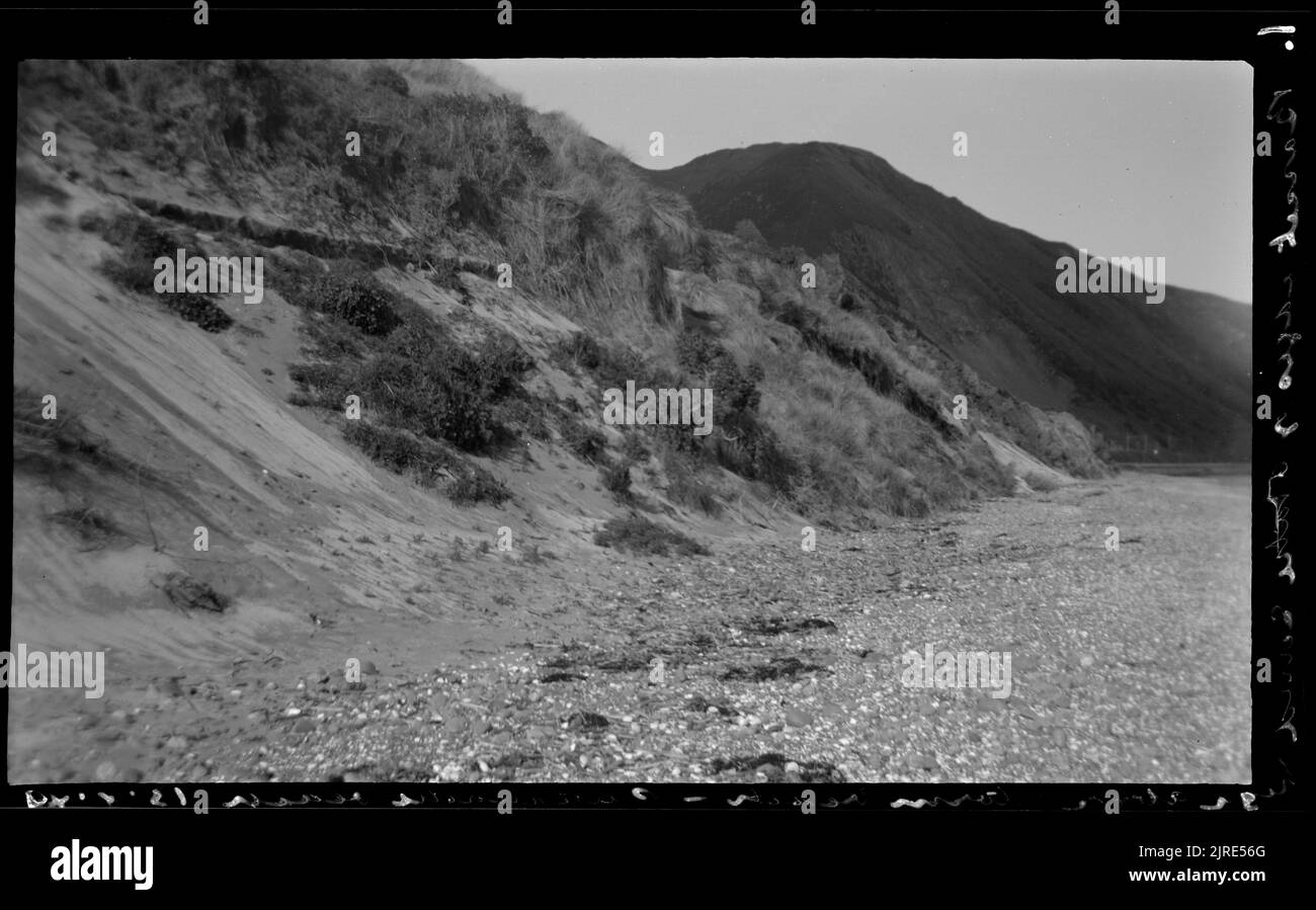 Bassit cages and Otaki sand high above storm beach Paekakariki Beach