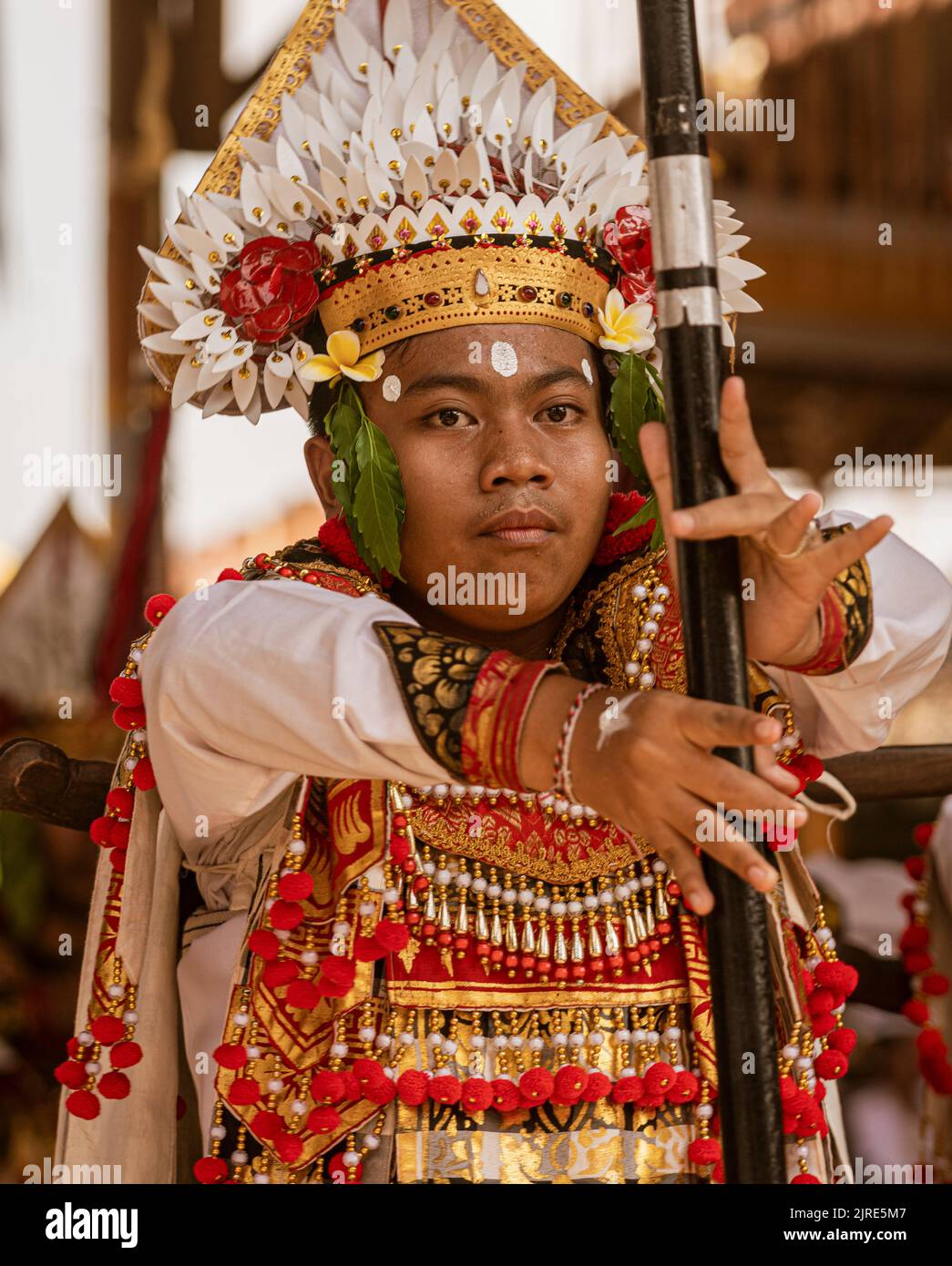 Young man dances at the temple on Galungan Day in Bali Stock Photo Alamy