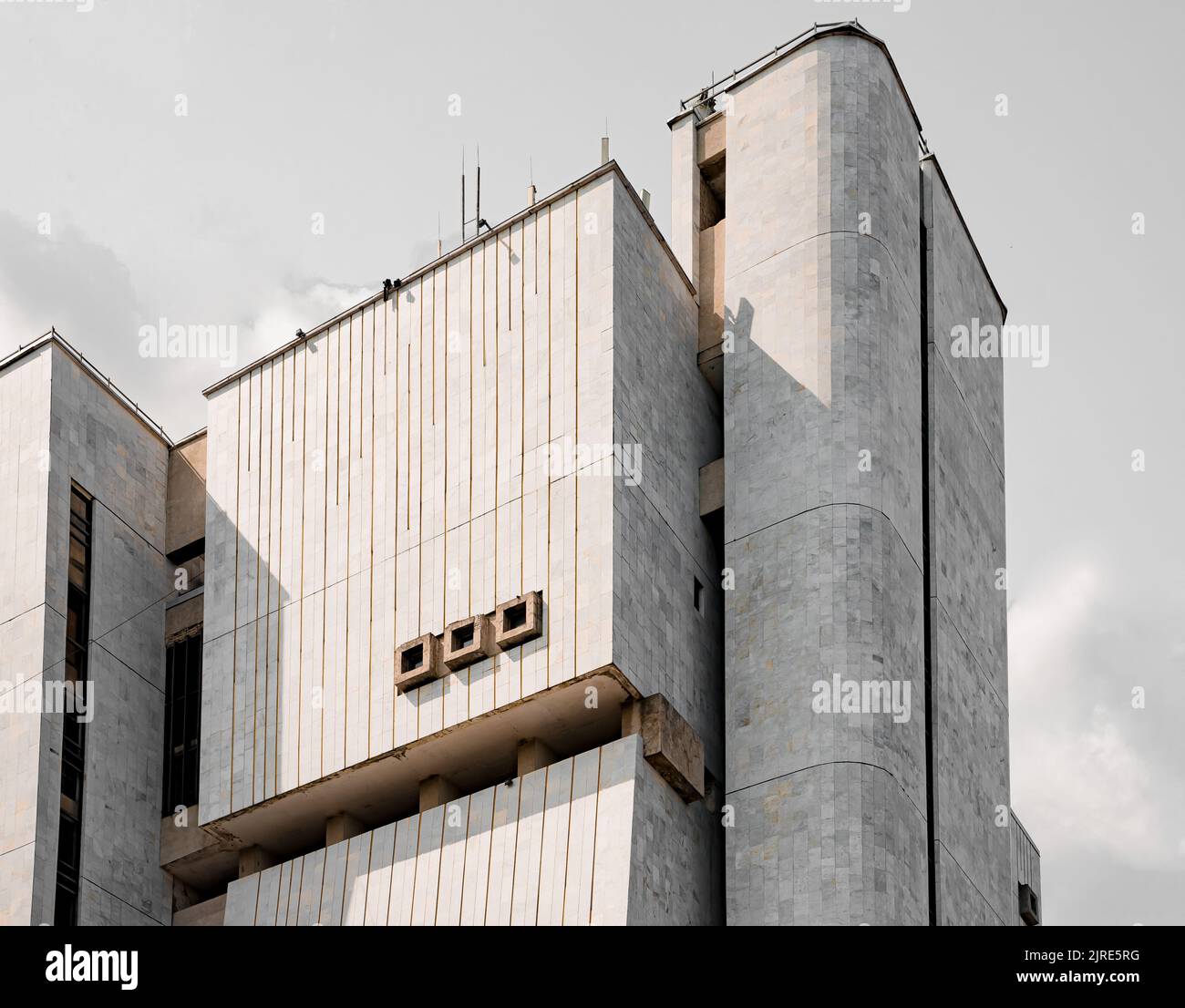 Soviet Brutalist Architecture. High gray walls with small