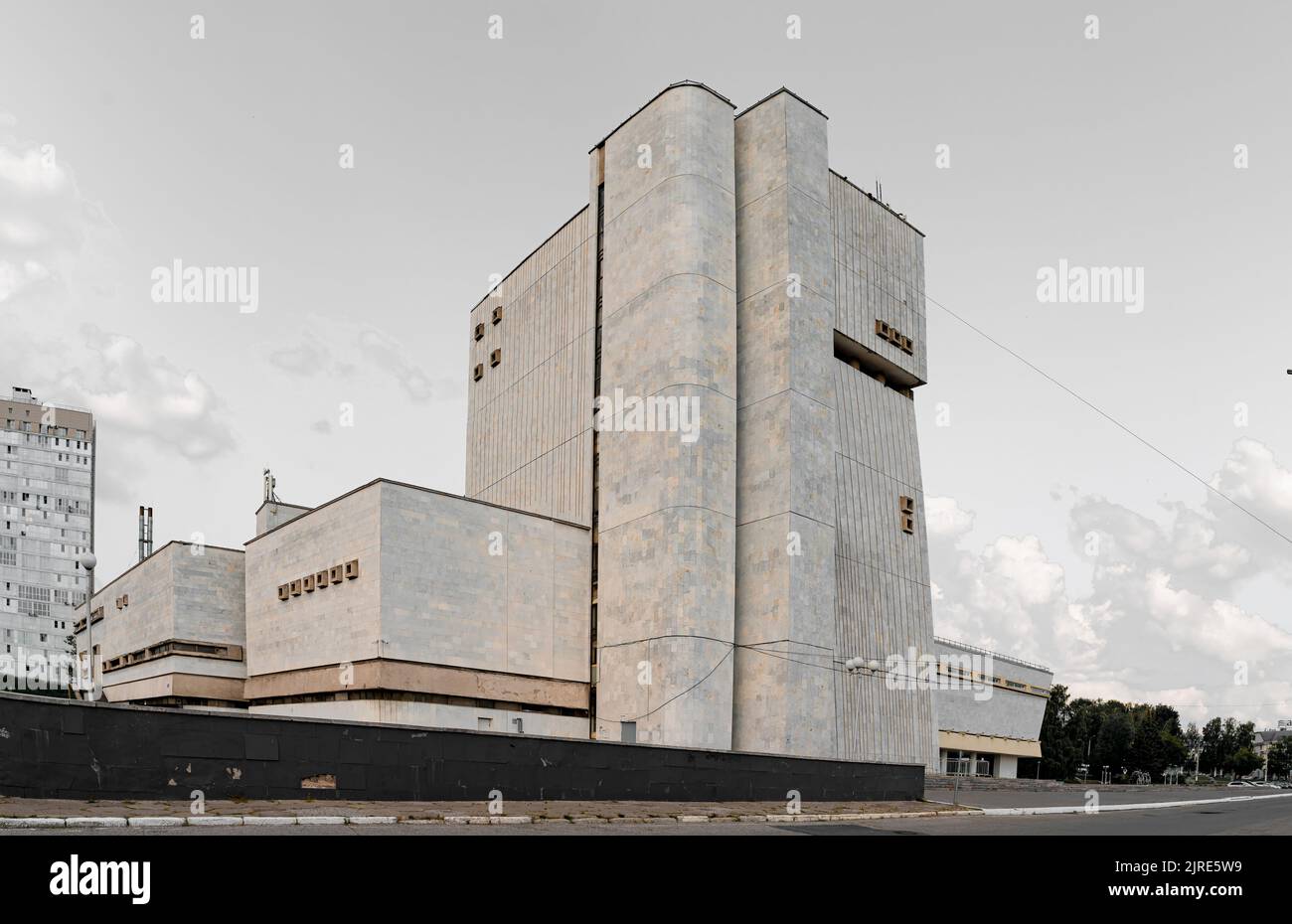 Soviet Brutalist Architecture. High gray walls with small