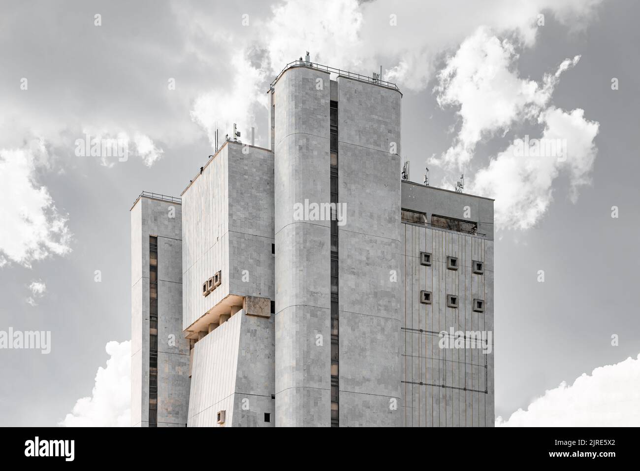 Soviet Brutalist Architecture. High gray walls with small