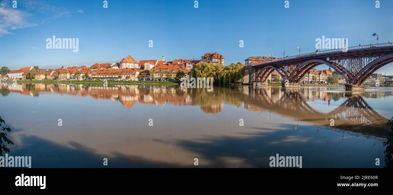 Lent district in Maribor, Slovenia. Popular waterfront promenade with historical buildings and the oldest grape vine in Europe. Stock Photo