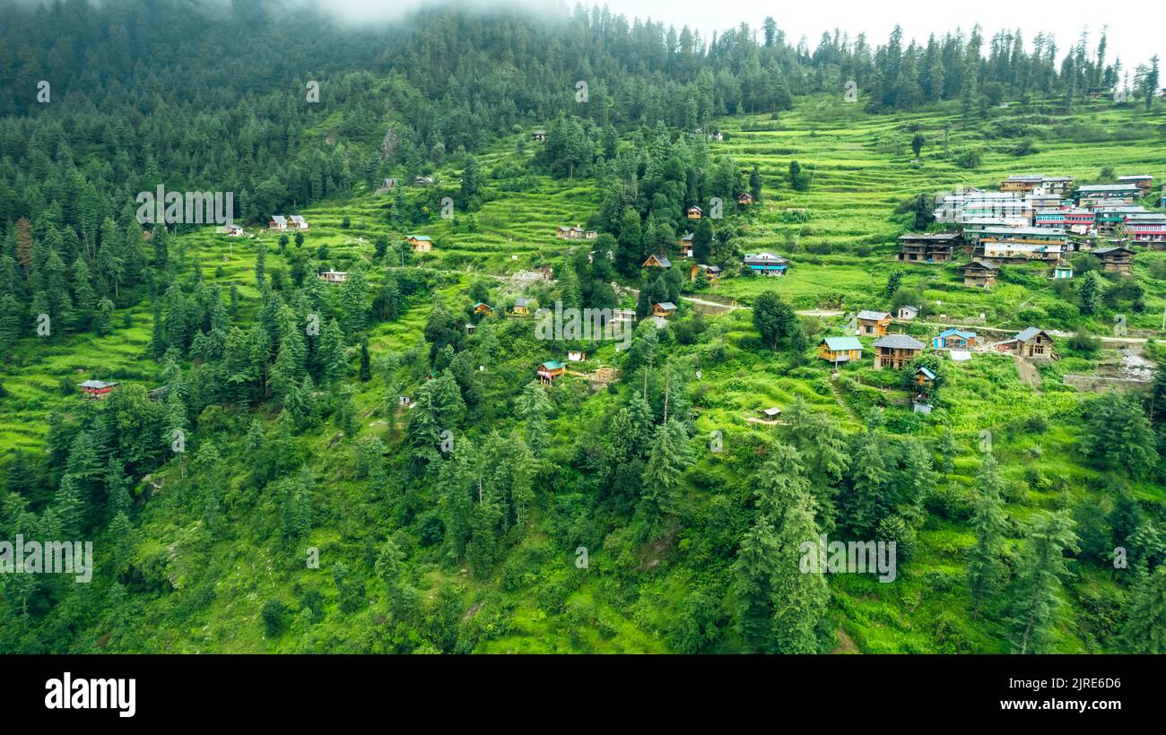 aerial landscape of rural village in the lush mountains of Himachal Pradesh India Stock Photo