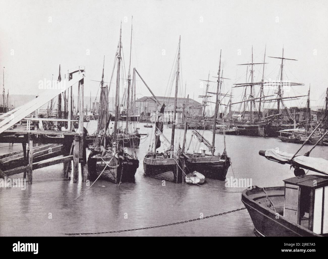 Newhaven, East Sussex, England.  View of the harbour in the 19th century.  From Around The Coast,  An Album of Pictures from Photographs of the Chief Seaside Places of Interest in Great Britain and Ireland.  published London, 1895, by George Newnes Limited. Stock Photo