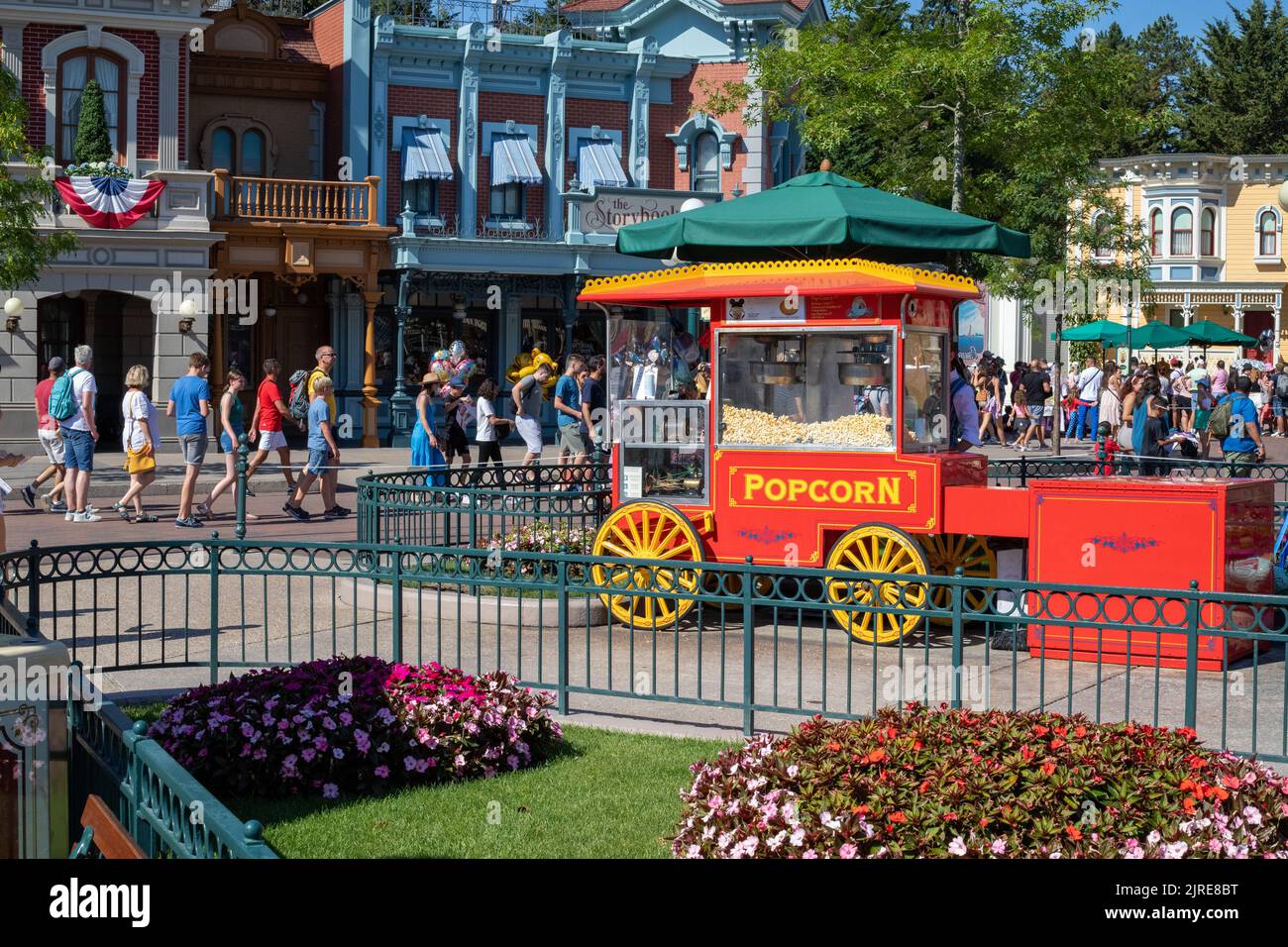 The popcorn shop at Disneyland Paris Main Street and people visiting