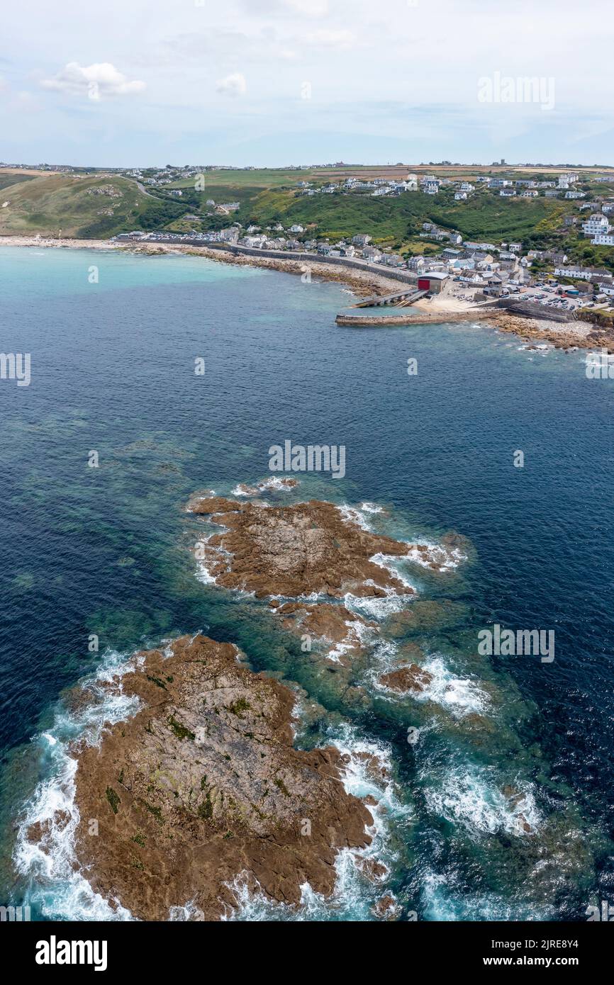 sennen cove cornwall showing rocky islands offshore elevated view vert Stock Photo