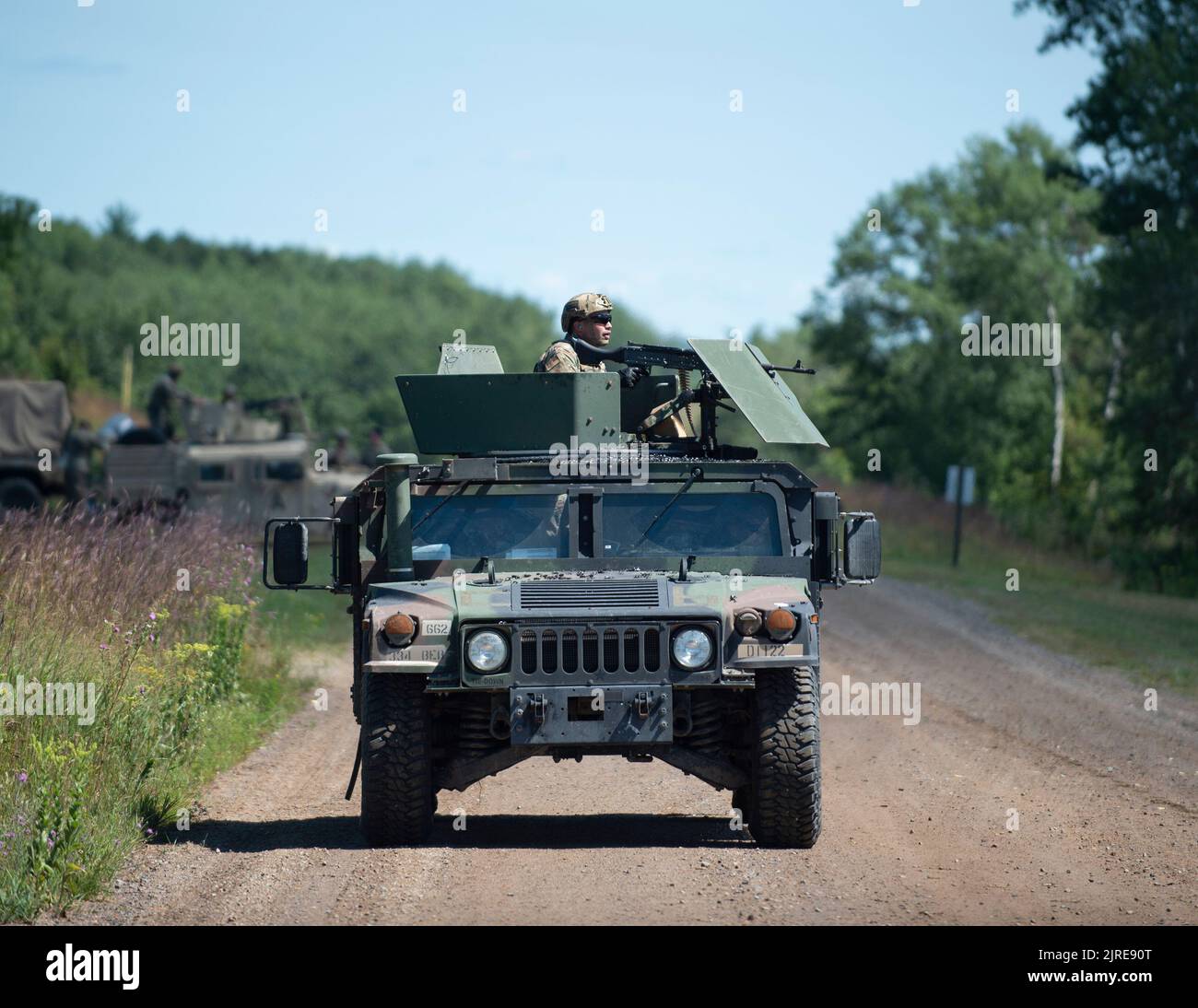 U.S. Air Force Airmen from the 123rd and 156th Security Forces Squadrons, are learning the basics of convoy combat firing from a HUMVEE in Little Falls, Camp Ripley, Minn., Aug. 8, 2022. The familiarization training allows the Airmen to become comfortable with new tactics in a controlled environment before using them.  (U.S. Air National Guard photo by Tech. Sgt. Amy M. Lovgren) Stock Photo