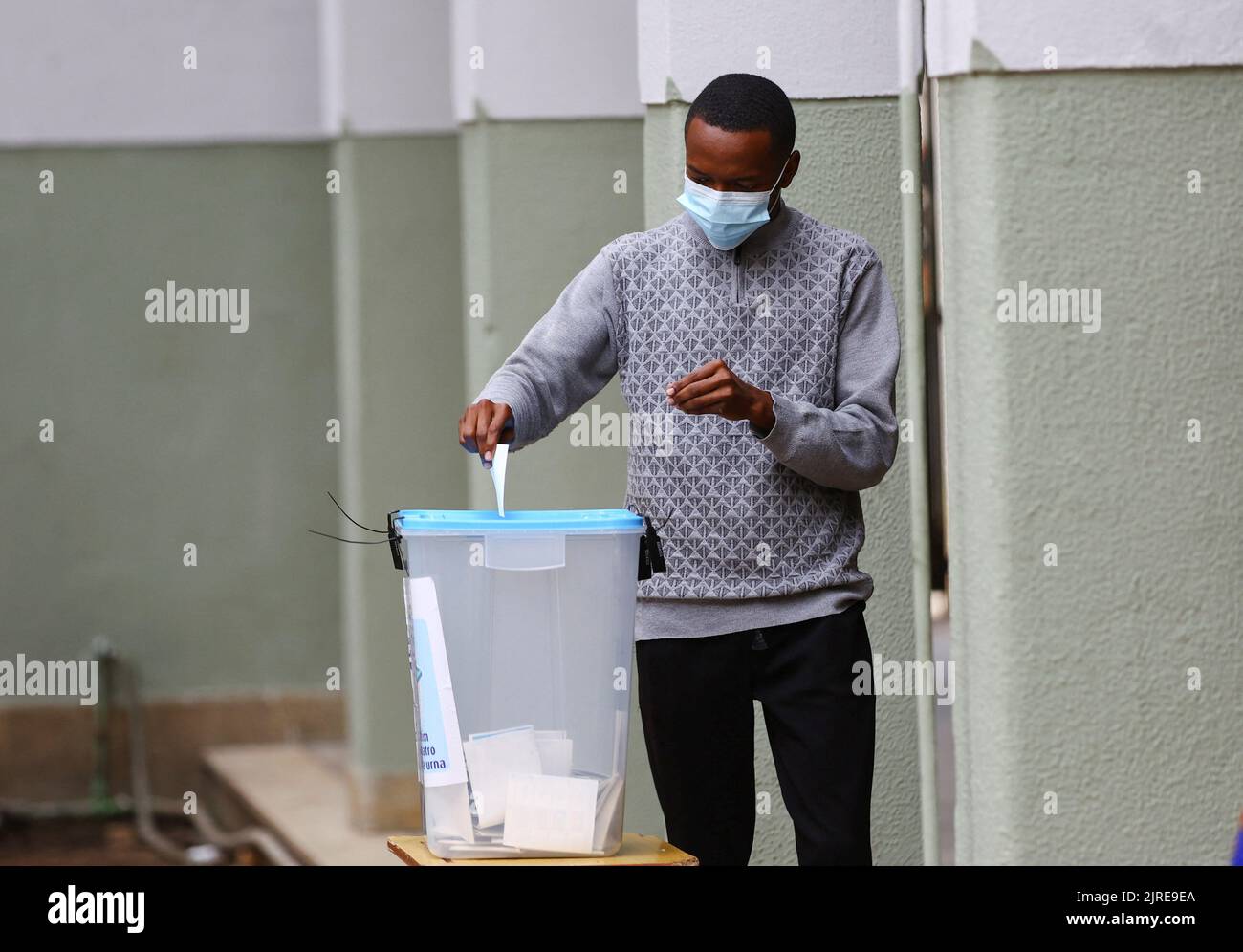 A man casts his vote during the general election at Nzinga Mbandi school, in the capital Luanda, Angola August 24, 2022. REUTERS/Siphiwe Sibeko Stock Photo