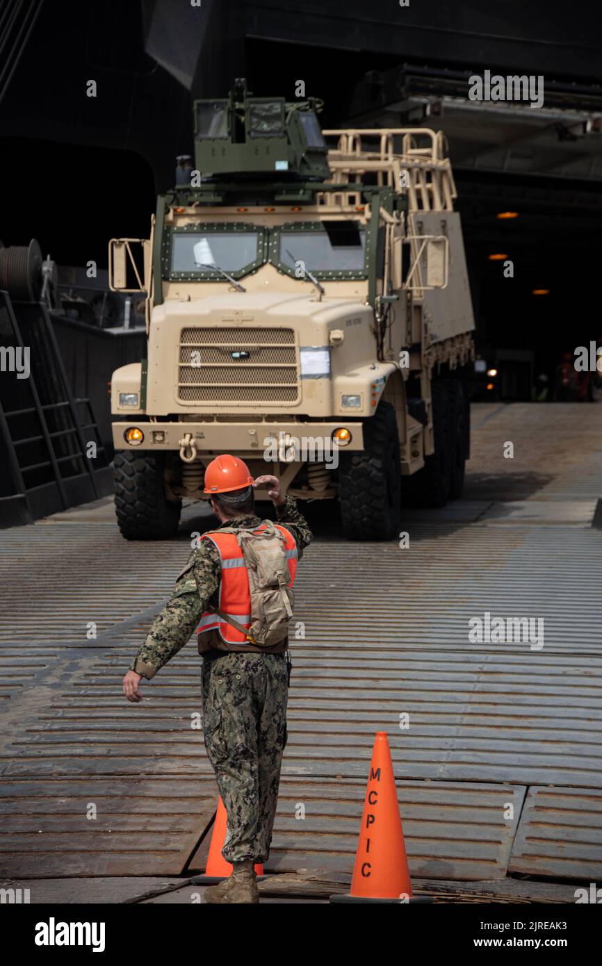 U.S. Navy Equipment Operator 3rd Class Nick Guhl with Combat Logistics
