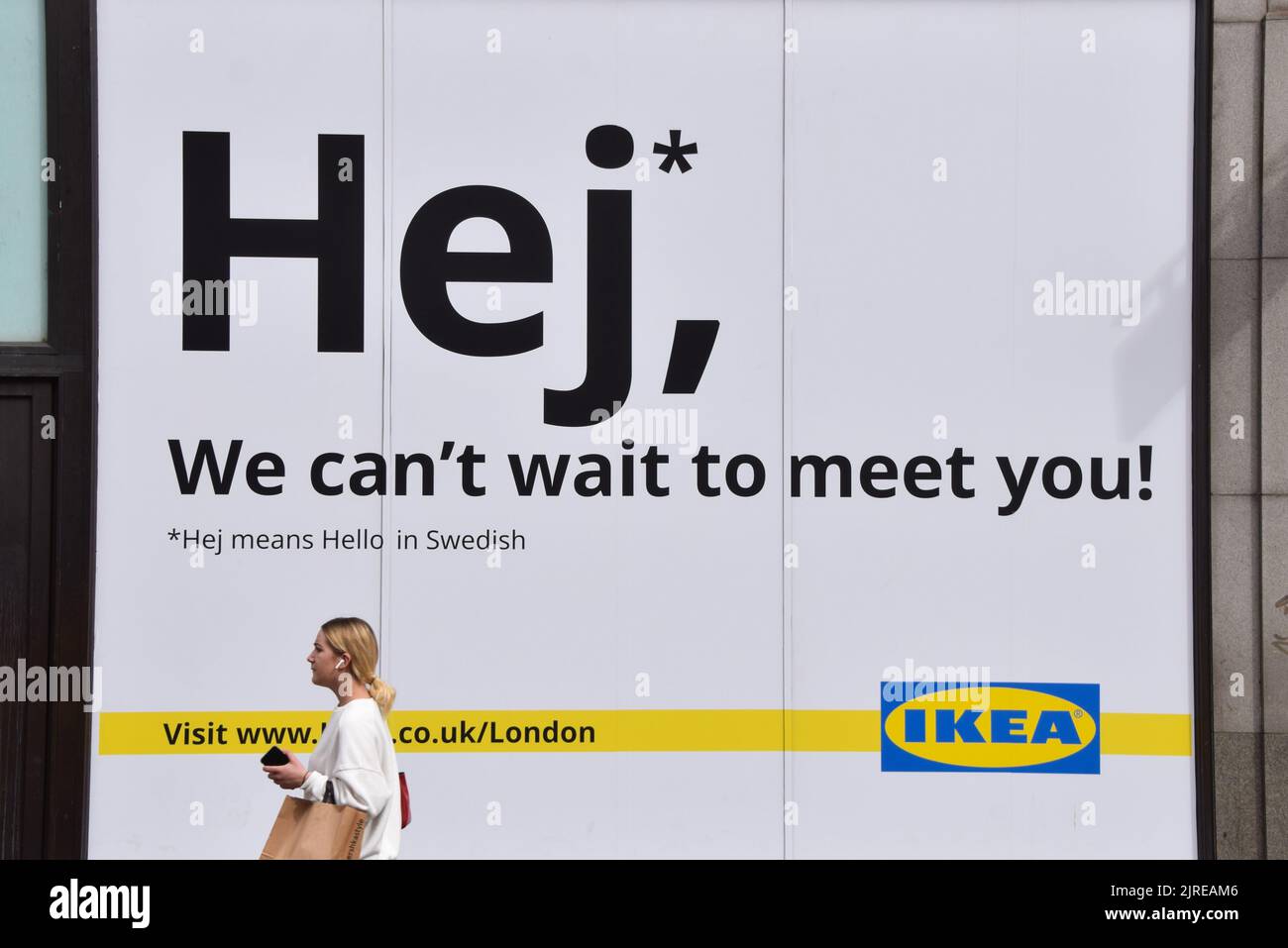 London, England, UK. 24th Aug, 2022. A woman walks past the shop window of the new IKEA store at the former site of Topshop on Oxford Street, set to open in 2023. (Credit Image: © Vuk Valcic/ZUMA Press Wire) Credit: ZUMA Press, Inc./Alamy Live News Stock Photo