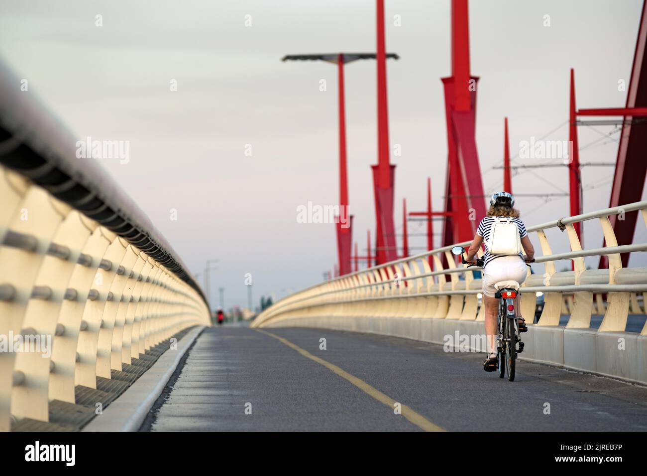 riding bicycle on sidewalk