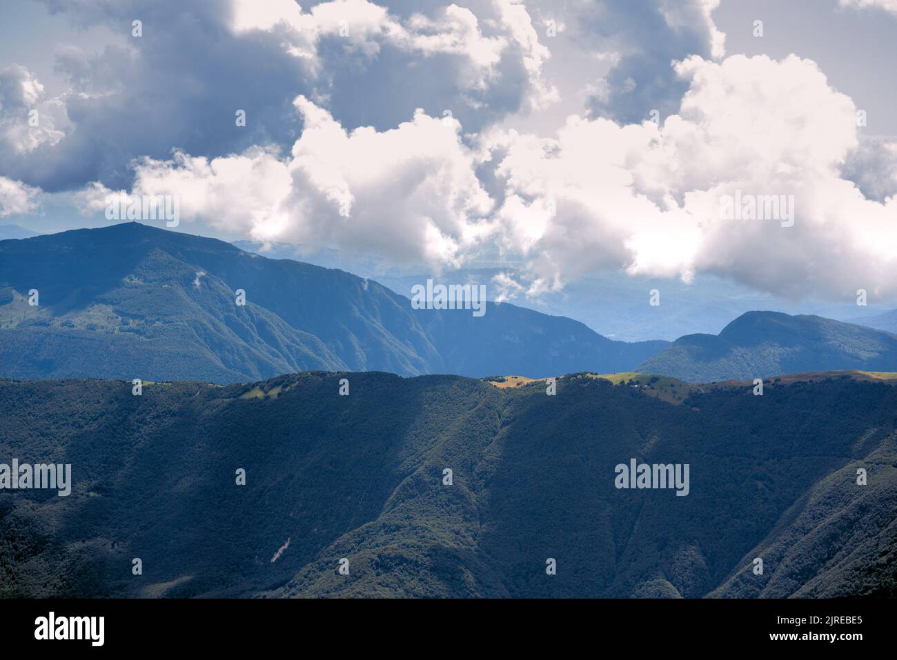 Clouds above mountains Stock Photo