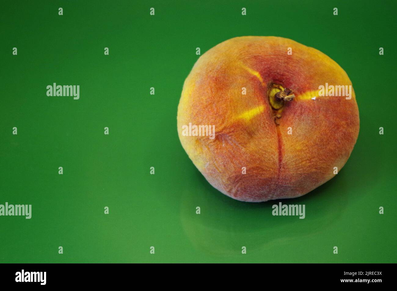 A singel Peach Fruit. Stock Photo