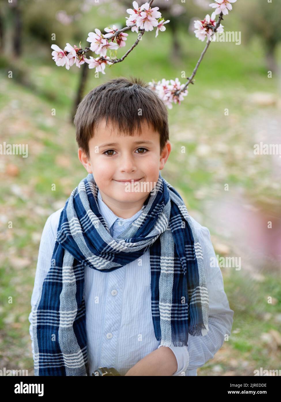 Portrait happy young boy looking at camera with smiling face Stock Photo