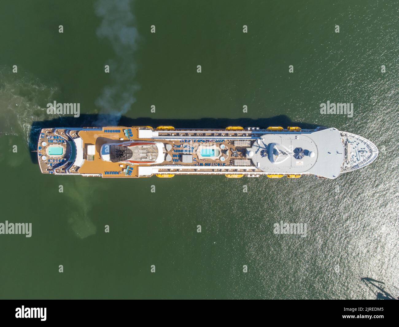 Cruise vessel Balmoral maiden call in Liepaja during Baltic sea summer cruise 2022.  Vessel approaching breakwater of Liepaja port. Aerial drone photo Stock Photo