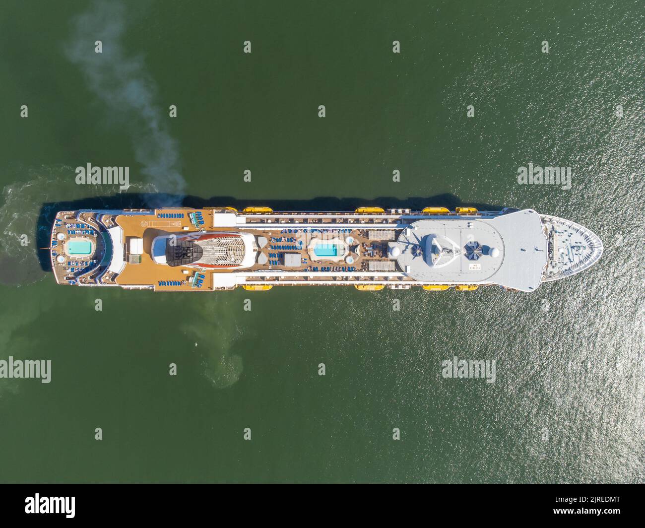 Cruise vessel Balmoral maiden call in Liepaja during Baltic sea summer cruise 2022.  Vessel approaching breakwater of Liepaja port. Aerial drone photo Stock Photo