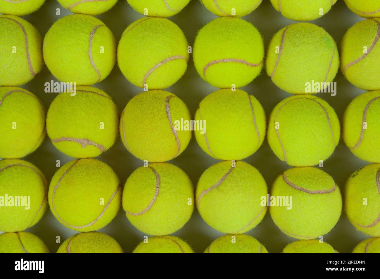 Used tennis balls. Tennis balls have only been yellow for 50 years