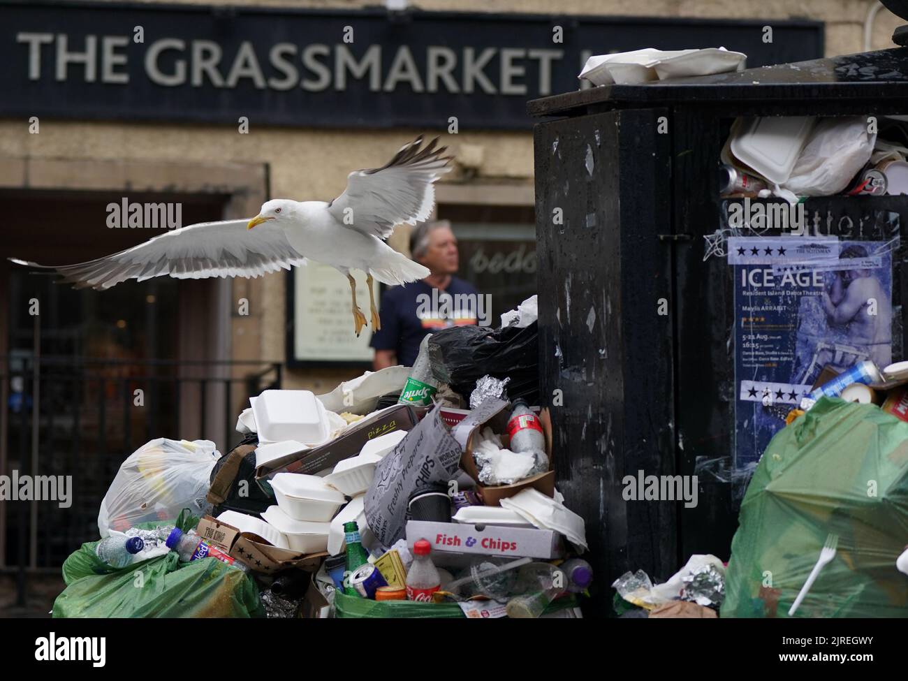 Overflowing bins in the Grassmarket area of Edinburgh where cleansing workers from the City of