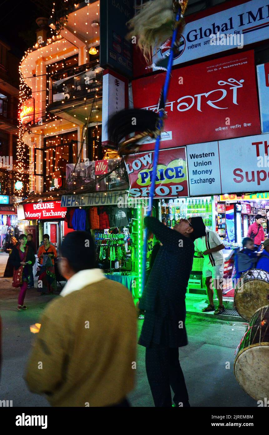 Parade of Nepalese people for celebration and respect praying rite to