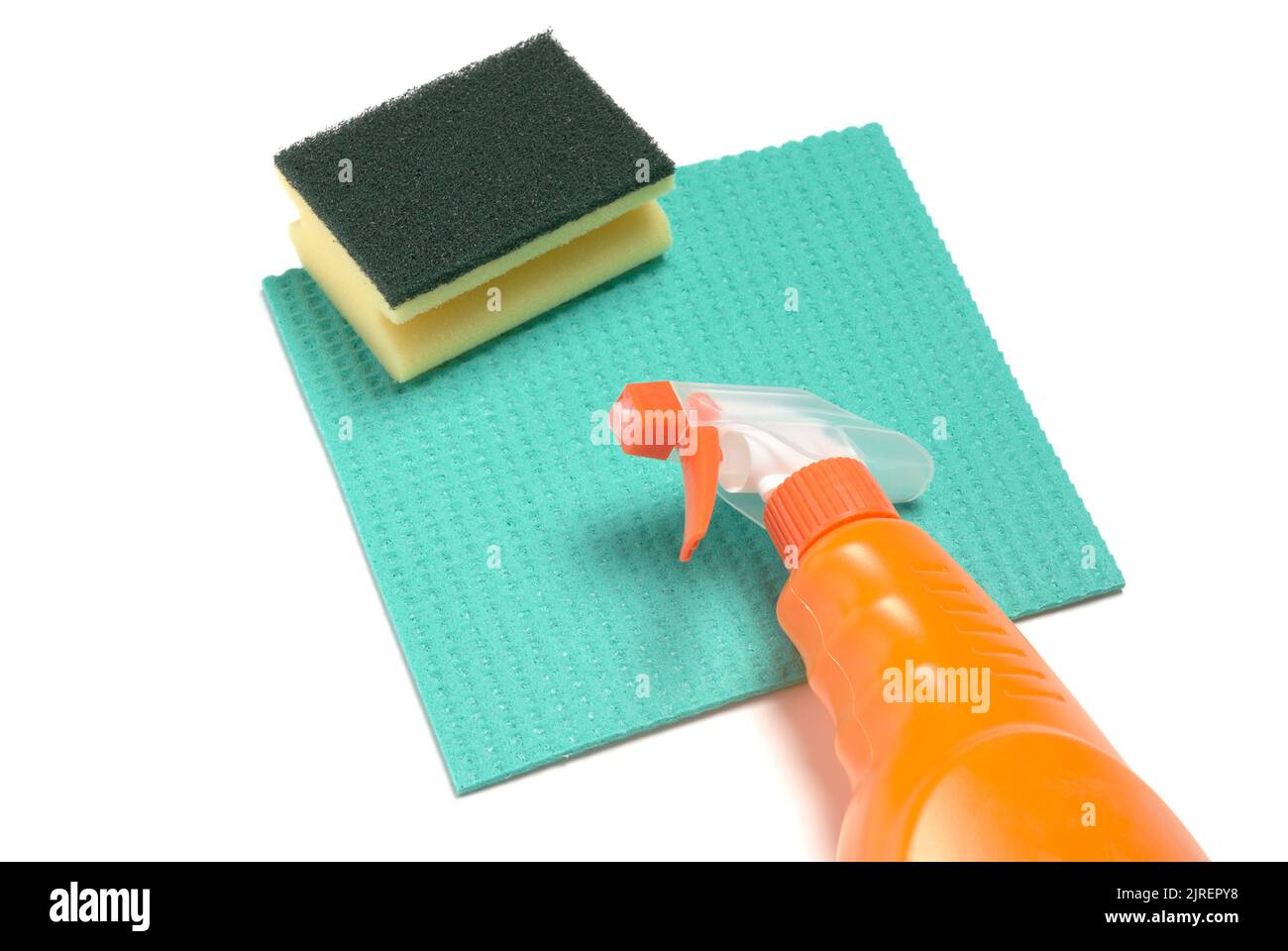 Cleaning products scouring pad sponge cloth spray bottle isolated on