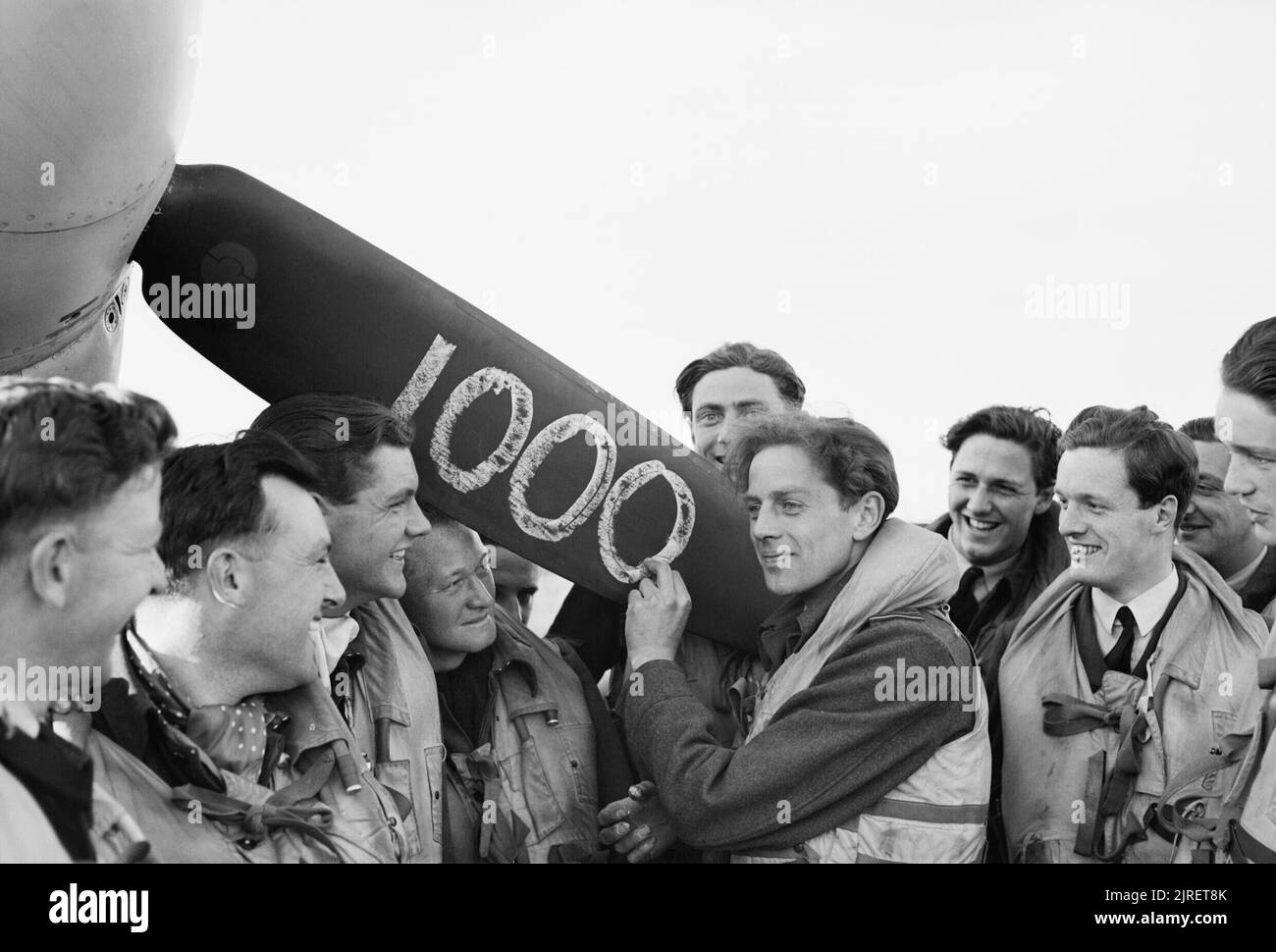Royal Air Force 1939-1945- Fighter Command Squadron Leader Edward 'Jack' Charles, commanding No 611 Squadron, chalks up the Biggin Hill Sector's 1,000th enemy aircraft, following a successful sweep over Normandy on 15 May 1943. That afternoon, Charles shot down two FW190s, while the CO of No 341 Squadron, Commandant Rene Mouchotte, destroyed another. As it was not clear which of the two pilots had secured the 1,000th kill, the honours - and sweepstake of ?GBP300 - were shared between them. Stock Photo