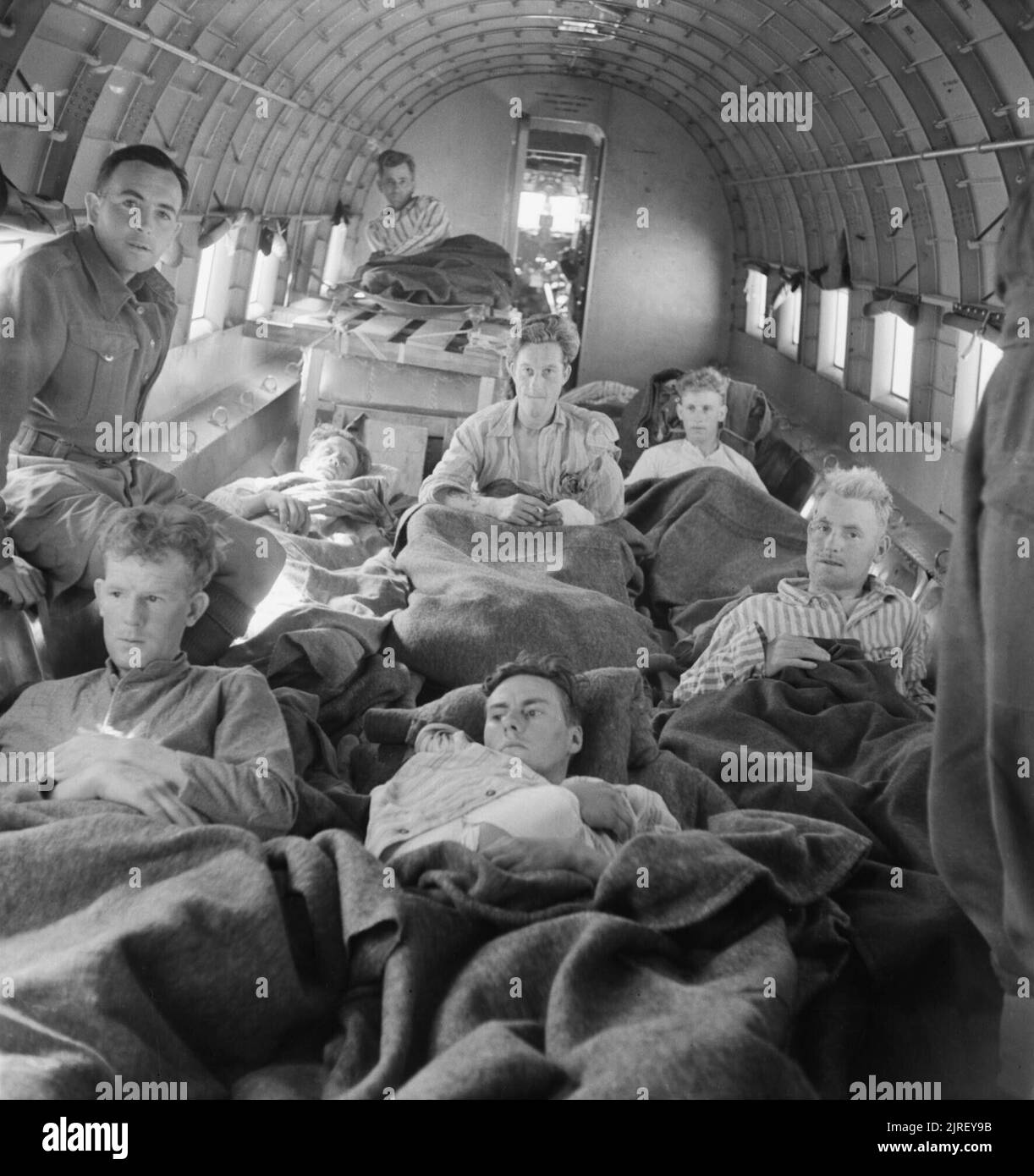 Royal Air Force Operations in the Middle East and North Africa, 1939-1943. Battle casualties loaded into a Lockheed Hudson Mark VI of No. 216 Group RAF at Castel Benito, Libya, for evacuation to hospitals in Egypt. Stock Photo