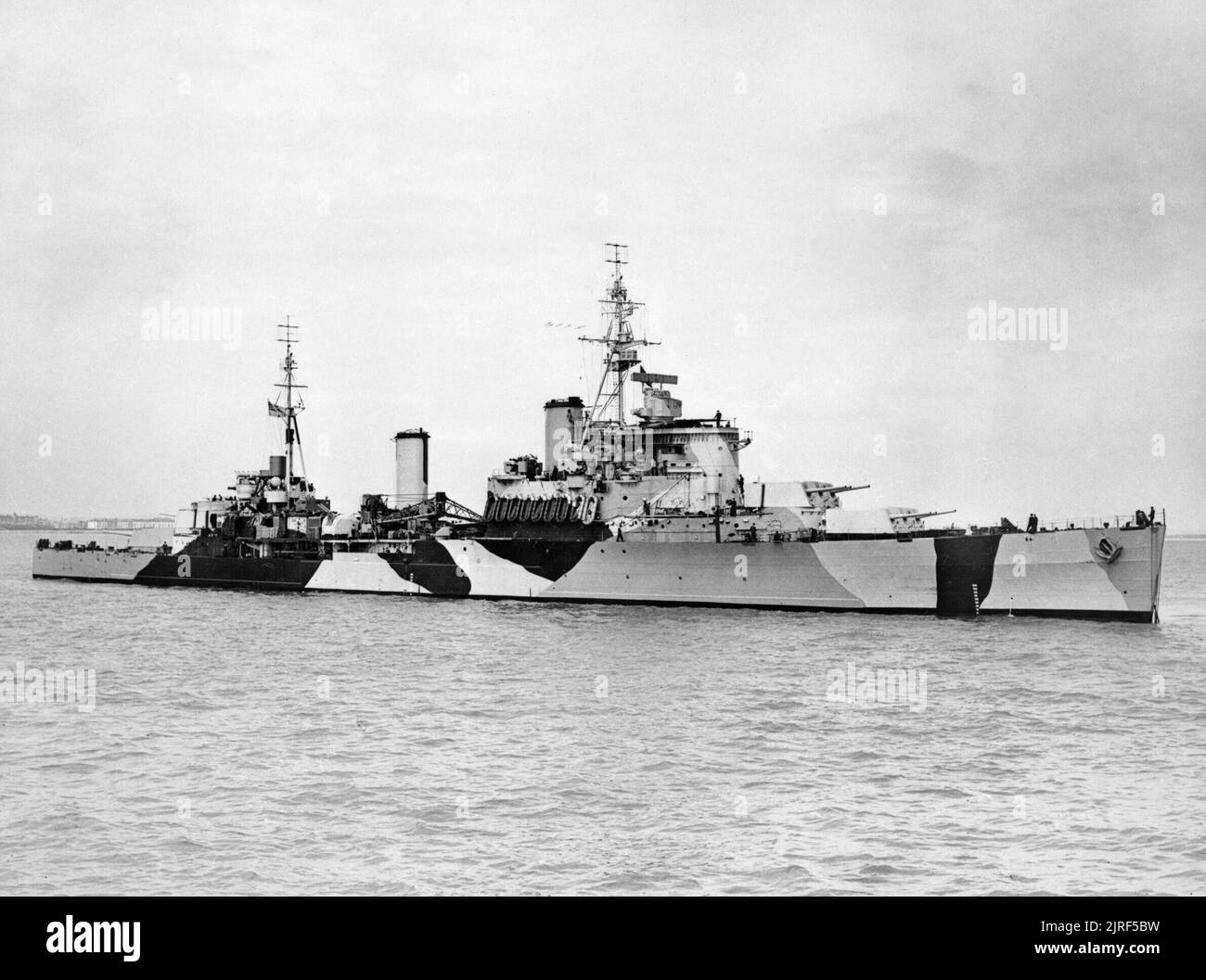 HMS JAMAICA, 18 September 1943. HMS JAMAICA, at anchor. Stock Photo