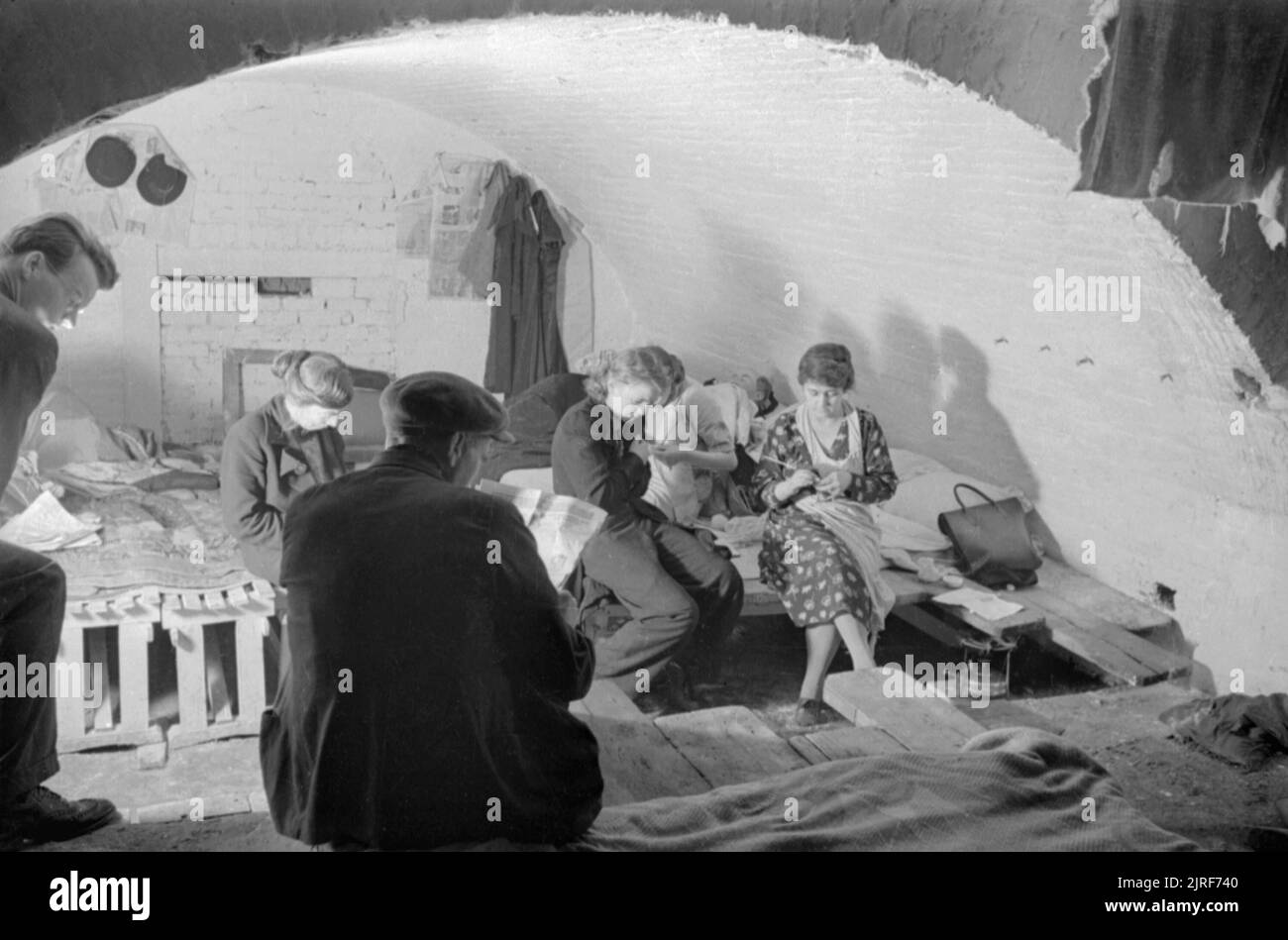 civilians-passing-the-time-in-a-public-air-raid-shelter-under-railway