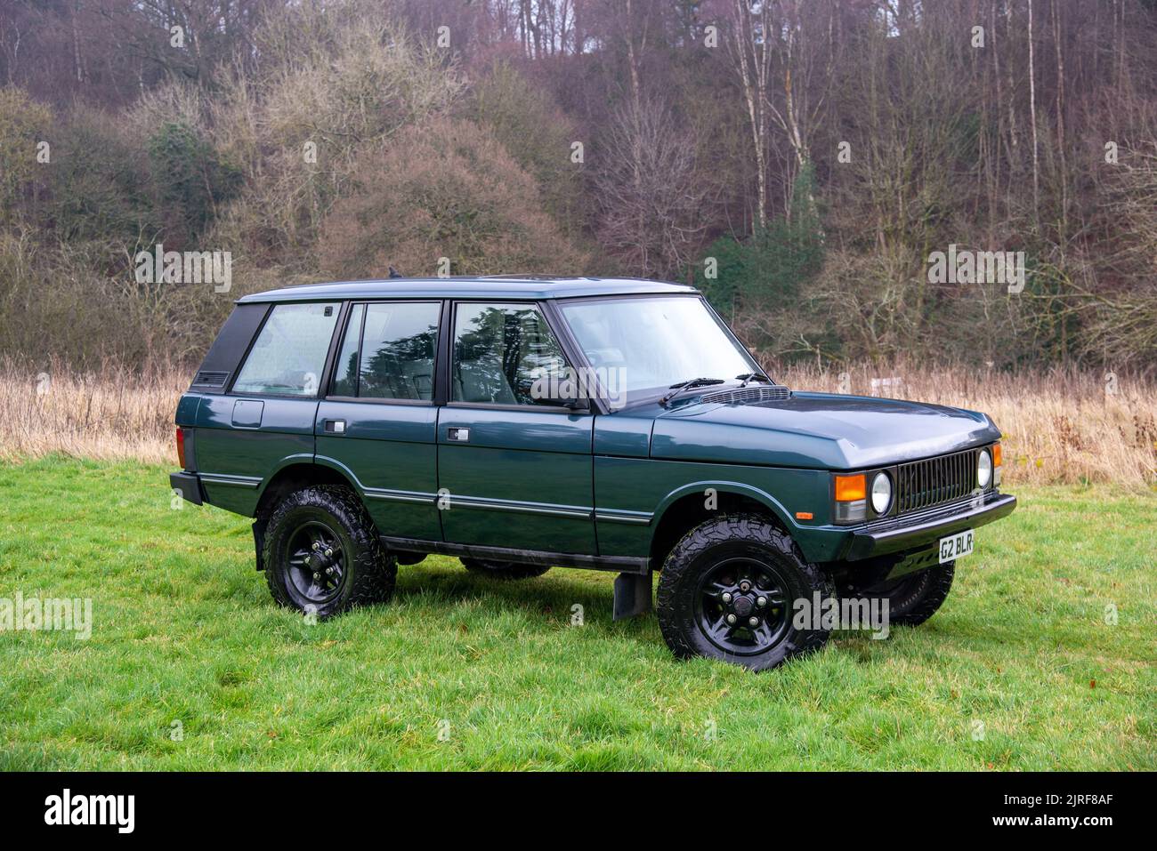 Range Rover classic parked on a farm field on an Autumn day Stock Photo