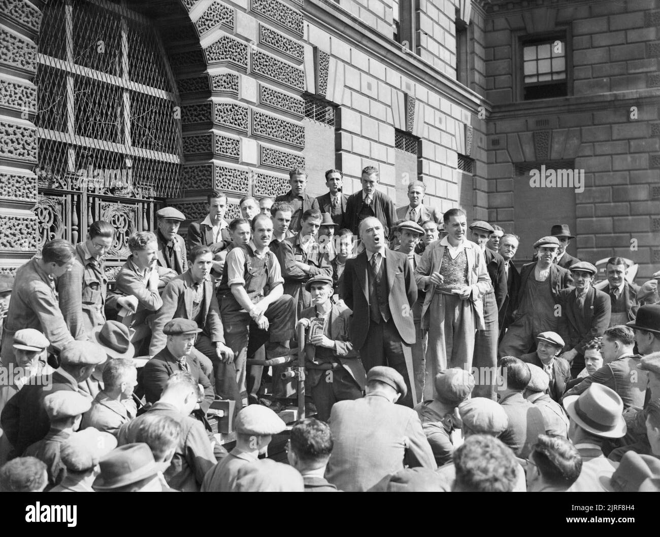 Harry Pollitt, General Secretary of the Communist Party of Great Britain, gives a speech to workers in Whitehall, London, 1941. Harry Pollitt, General Secretary of the Communist Party of Great Britain, gives a speech to workers in Whitehall, London, 1941. Stock Photo