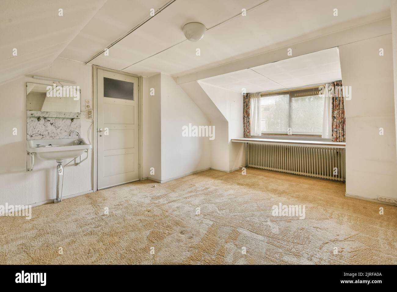 Boiler room of an apartment building with pipes and metering devices. A