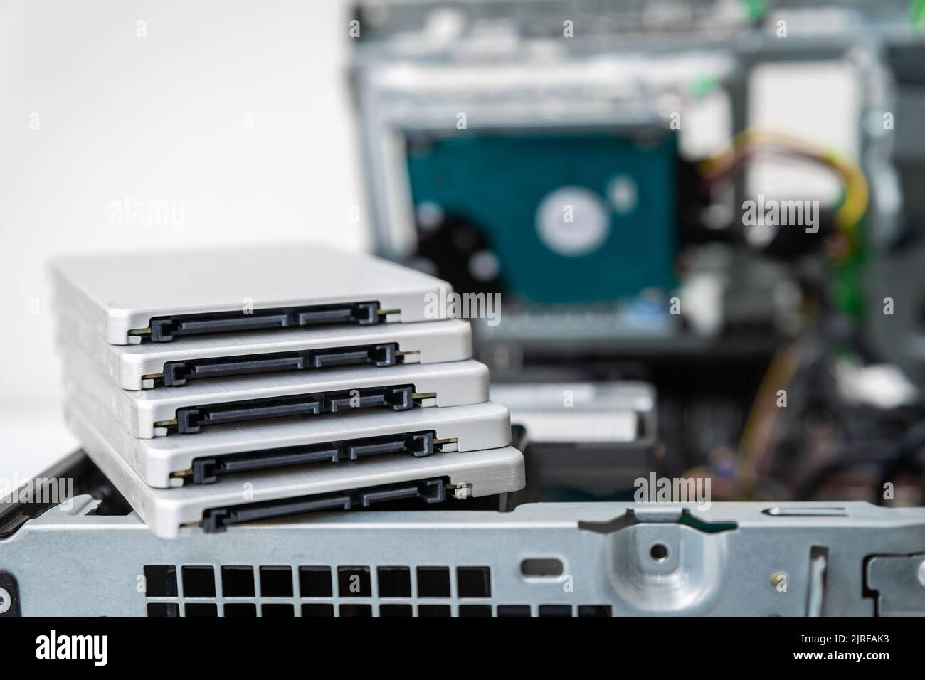 Closed-up view of SSD hard disk drives on top of business desktop PC Stock Photo