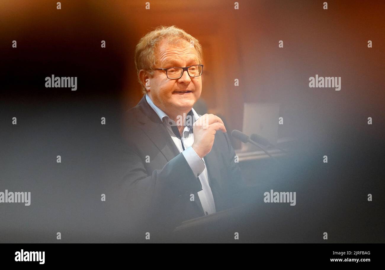 Hamburg, Germany. 24th Aug, 2022. Jens Kerstan (Bündnis 90/Die Grünen), Senator for Environment, Climate, Energy and Agriculture in Hamburg, speaks during the session of the Hamburg Parliament at City Hall. Credit: Marcus Brandt/dpa/Alamy Live News Stock Photo