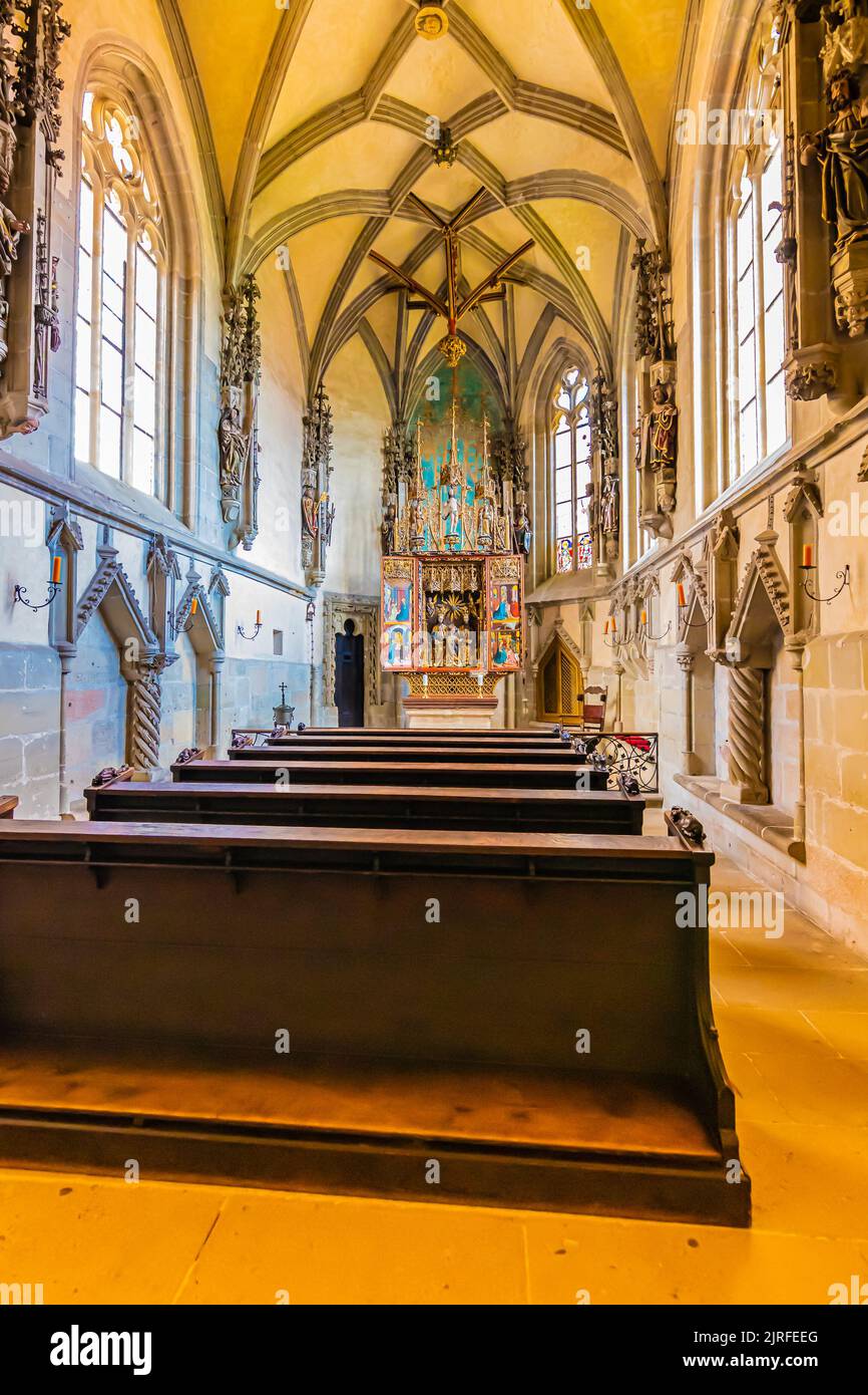 Krivoklat, Czech Republic - 12.6.2020: Interior of the chapel at Krivoklat castle. Gothic altar. Tourist are visiting the historical religion building Stock Photo