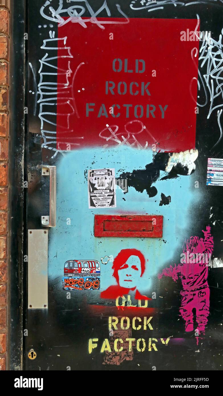 Old Rock Factory, doorway graffiti and street art, handle & letterbox, Deansgate, Blackpool , Lancs, England, FY1 1BN Stock Photo
