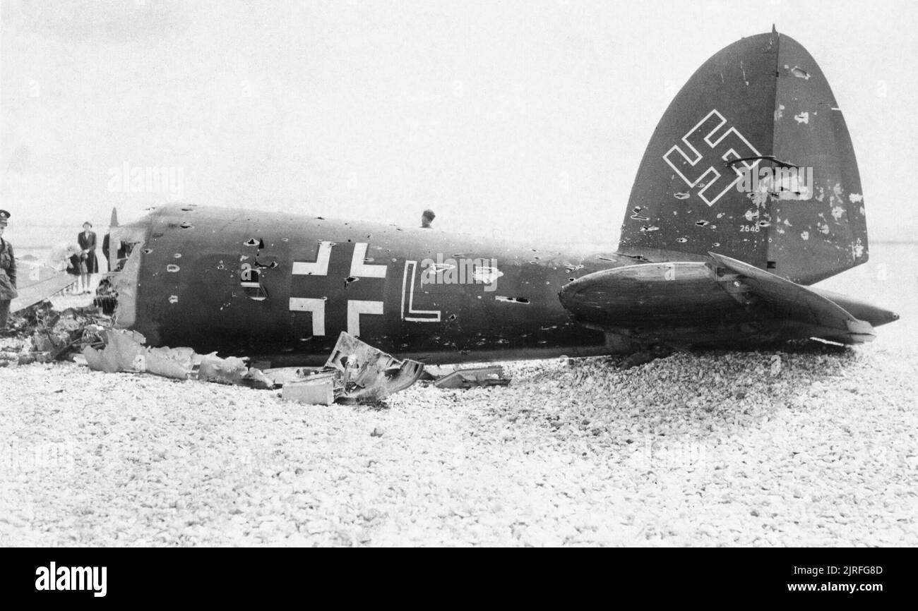 The Battle of Britain The rear fuselage of Heinkel He 111H (G1+LK) of 2./KG 55 on East Beach, Selsey in Sussex. The bomber was shot down by P/O Wakeham and P/O Lord Shuttleworth of No. 145 Squadron, 11 July 1940. Stock Photo