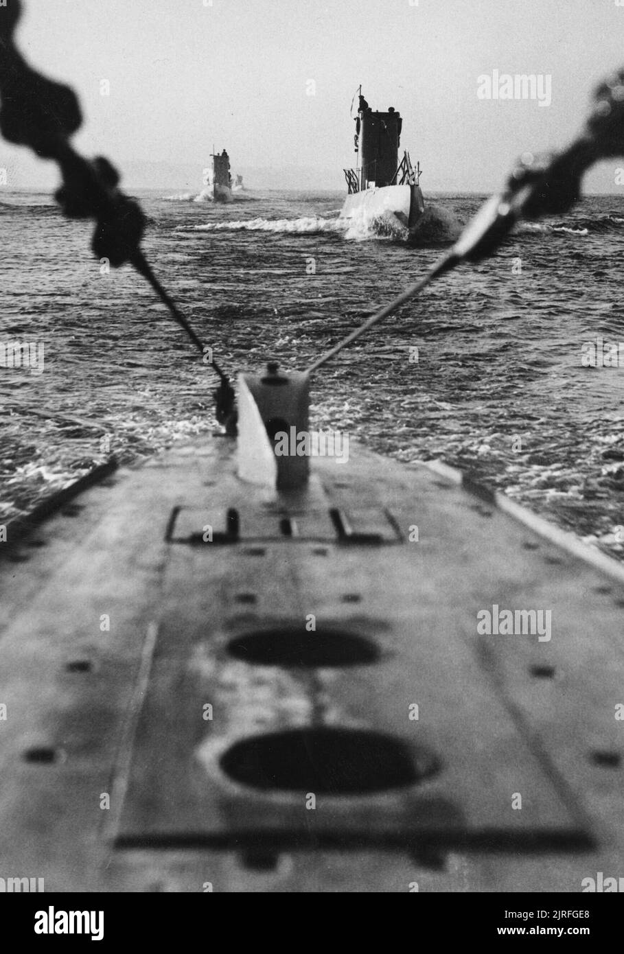 The German Navy in the Second World War German Type VIIA U-boats in line astern while training in the Baltic. Stock Photo