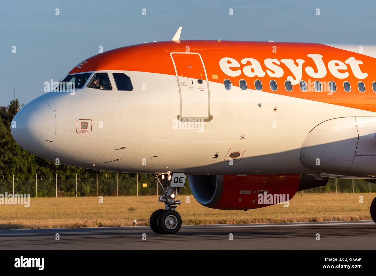 easyJet Airbus A319 airliner jet plane OE-LQE taxiing after landing at London Southend Airport, Essex, UK. Front, nose of airplane with easyJet brand Stock Photo