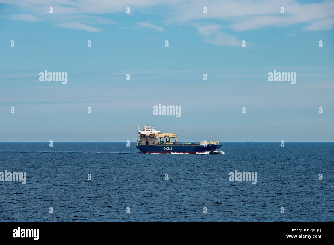 The Star Herdla, owned by the shipping company G2 Ocean, in the Mediterranean Sea. She is an open hatch gantry crane vessel carrying general cargo, built in 1994 and sailing under the Norwegian flag Stock Photo