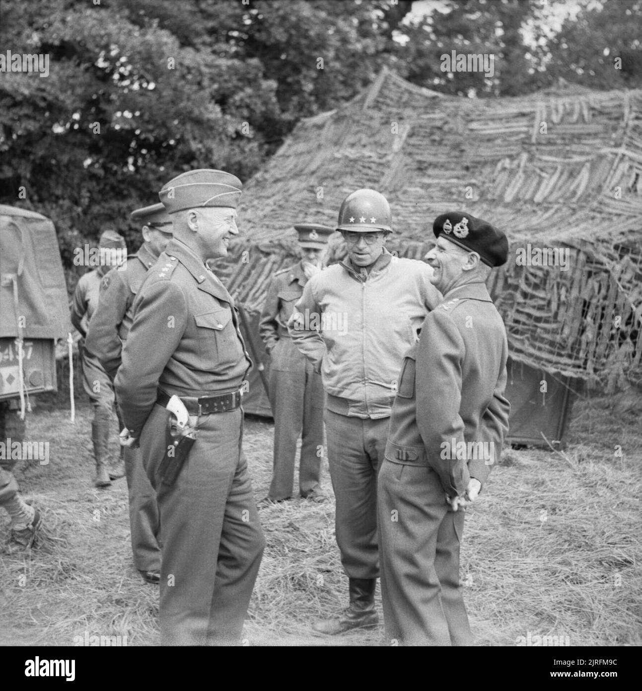 General montgomery with generals patton left and bradley centre at