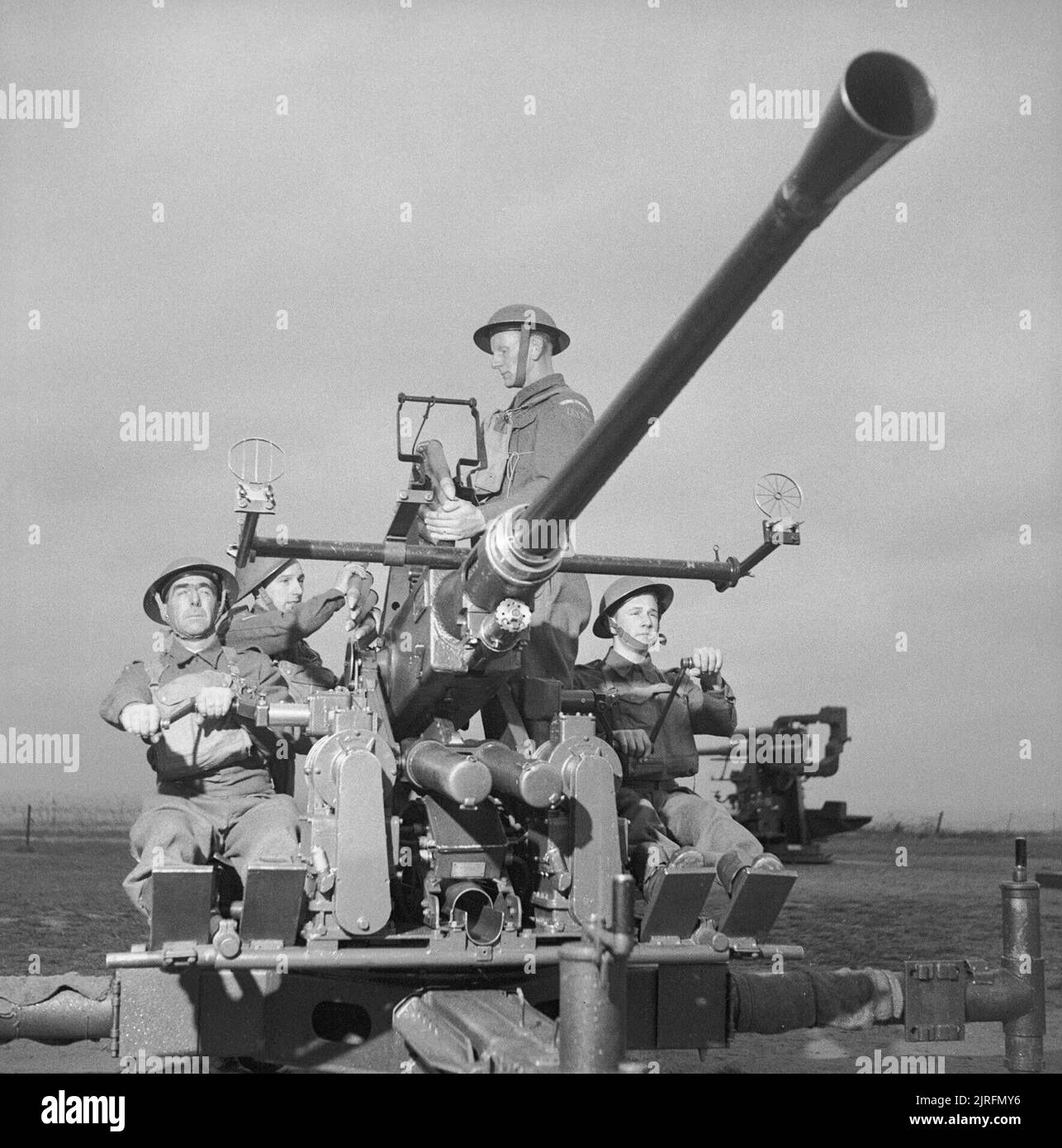 Home Guard soldiers manning a Bofors gun, 16 November 1943. The Home Guard: A Home Guard detachment manning an Anti-Aircraft Command Bofors gun. Stock Photo
