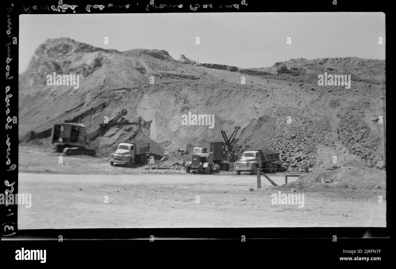 Power shovels, loading lorries (Rongotai scheme), 01 February 1956, by Leslie Adkin. Stock Photo