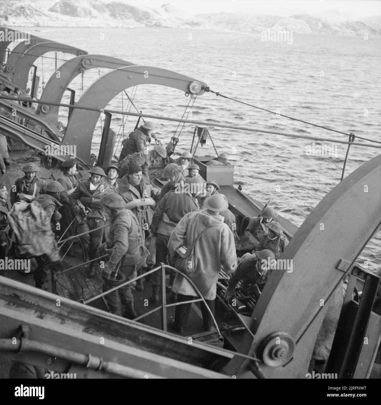 Raid on Vaagso, 27 December 1941 British troops embarking onto HMS PRINCE LEOPOLD after the raid. Stock Photo