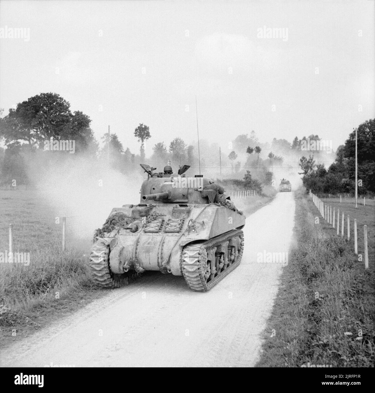 Sherman tanks advancing towards Vire, Normandy, 2 August 1944. Sherman