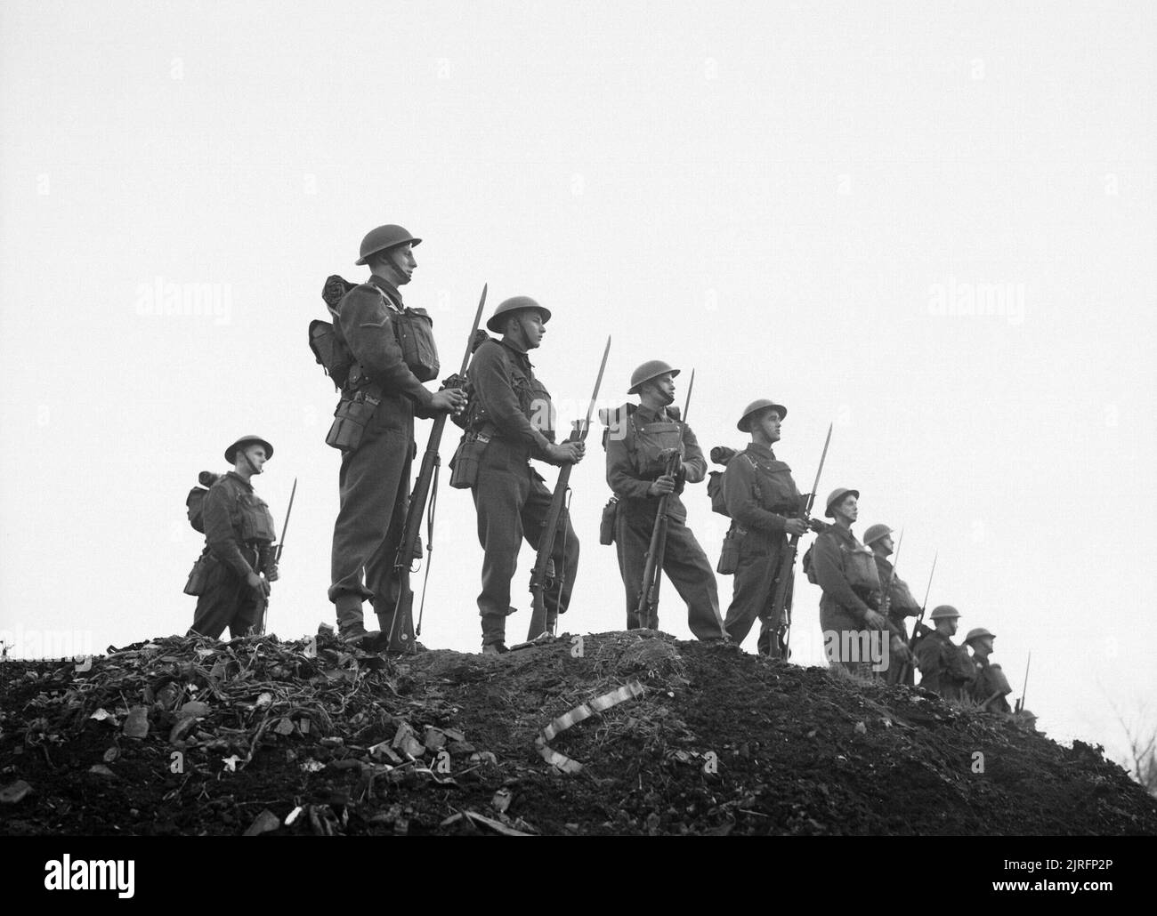Soldiers of the East Surrey Regiment pose with fixed bayonets at Chatham in Kent, 25 November 1940. Soldiers of the East Surrey Regiment pose with fixed bayonets at Chatham in Kent, 25 November 1940. Stock Photo